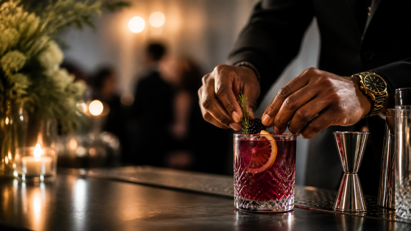 Bartender finishing a signature cocktail at an elegant event